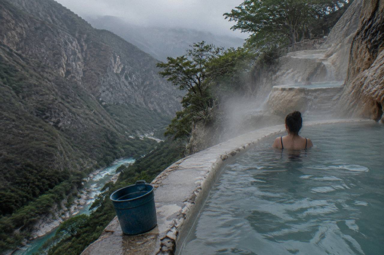 Thermal pools built into the cliffside overlooking the green canyon at Tolantongo